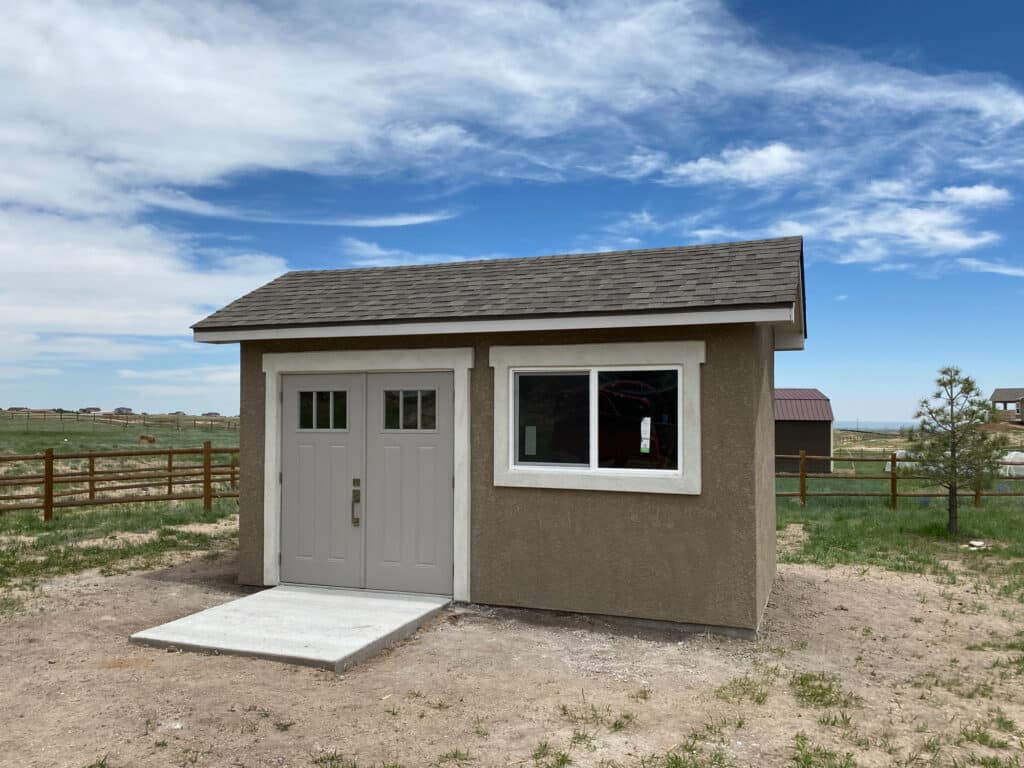 Custom Built Stucco Shed - Footprint Decks and Design proudly serves Colorado Springs, Monument, Castlerock, Denver, Peyton, and Black Forrest.