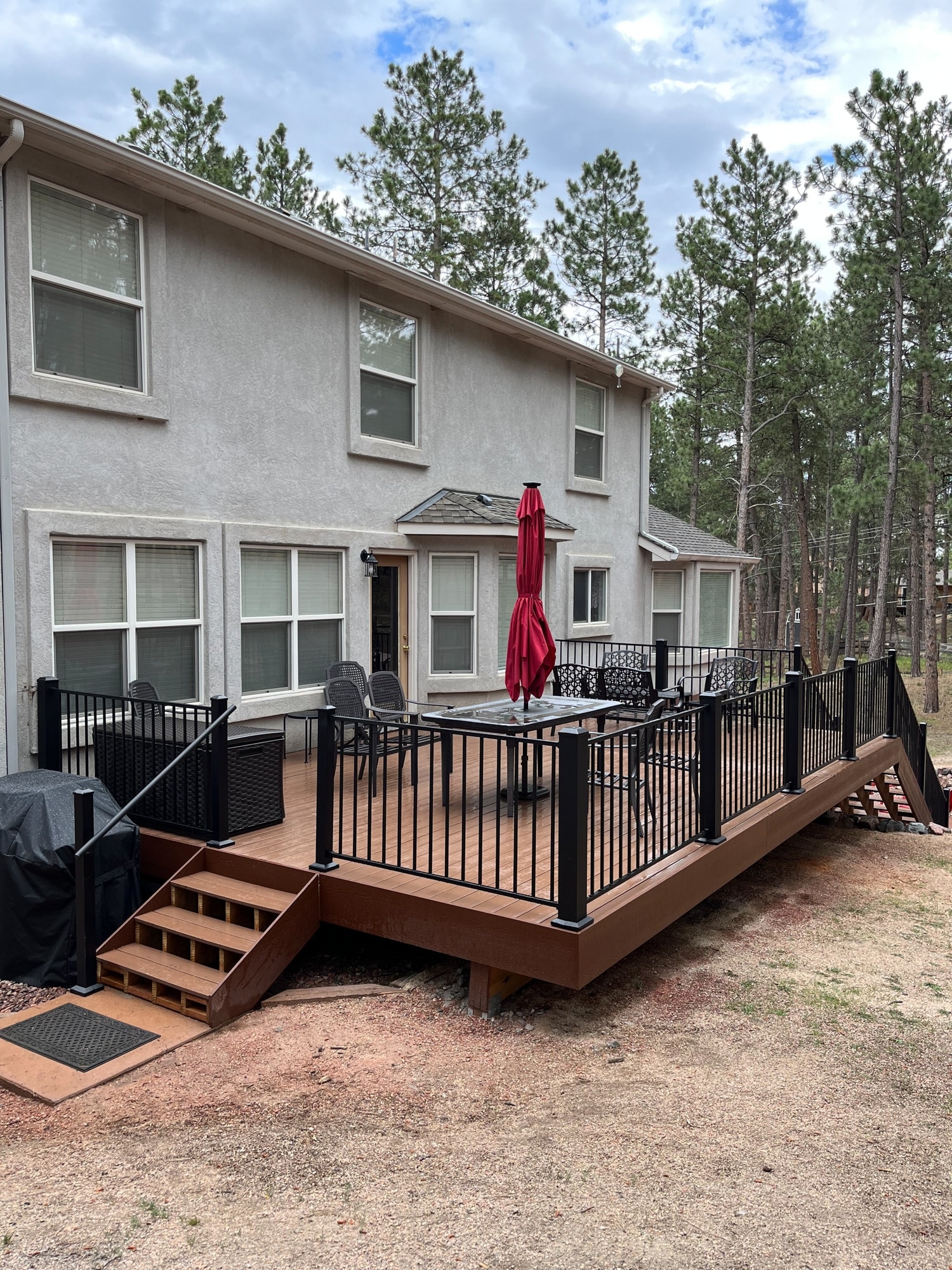 Custom Built Large Modern Style Deck - Footprint Decks and Design proudly serves Colorado Springs, Monument, Castlerock, Denver, Peyton, and Black Forrest.