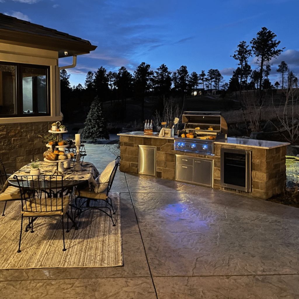Outdoor kitchen Colorado Parade of Homes - Footprint Decks and Design proudly serves Colorado Springs, Monument, Castlerock, Denver, Peyton, and Black Forrest.