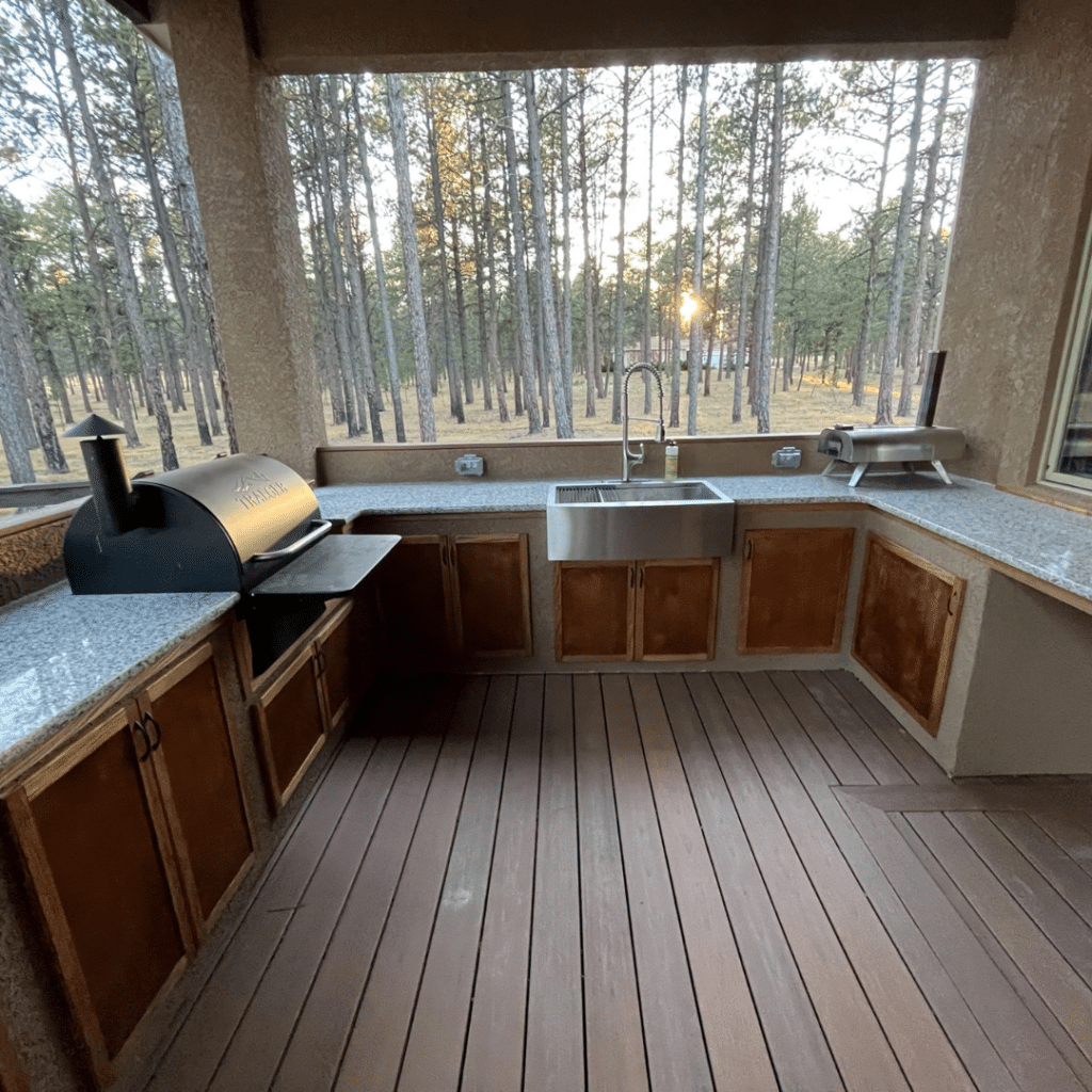 Custom Built Covered Outdoor Kitchen - Footprint Decks and Design proudly serves Colorado Springs, Monument, Castlerock, Denver, Peyton, and Black Forrest.