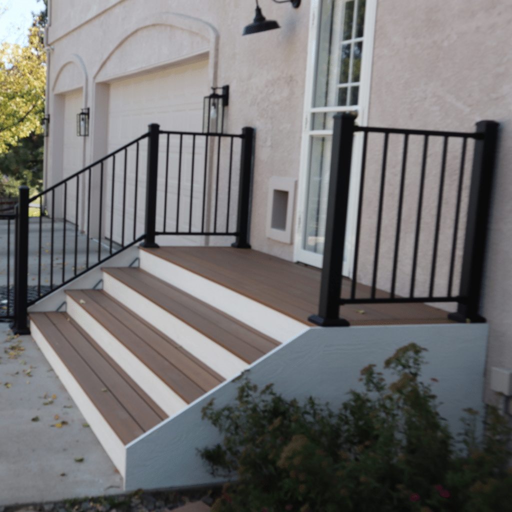 Custom Built Stairs and Rail - Footprint Decks and Design proudly serves Colorado Springs, Monument, Castlerock, Denver, Peyton, and Black Forrest.